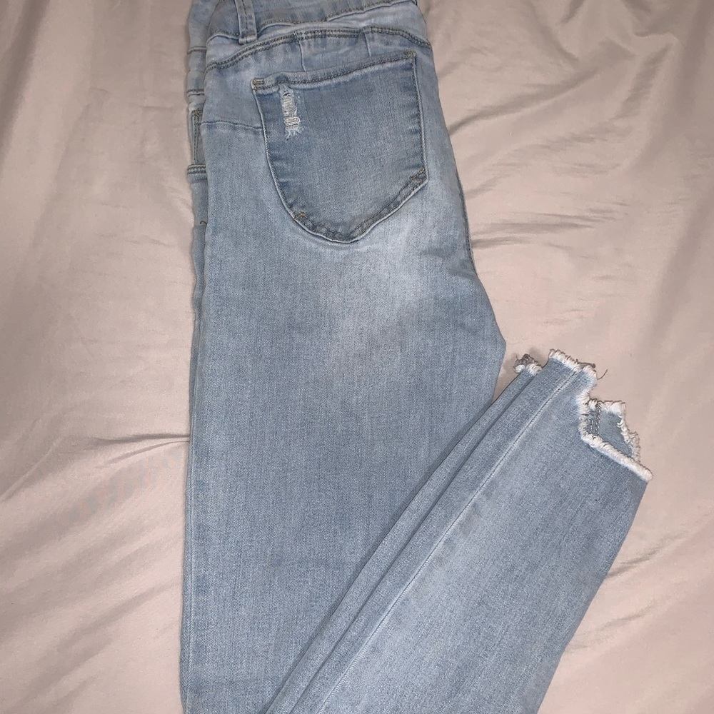 Light washed blue ripped jeans